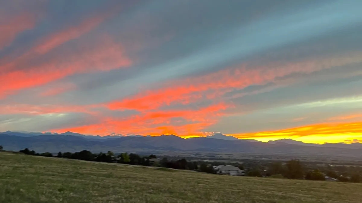 The trail at the edge of the grassland east of Niwot, looking west toward the foothills at sunset